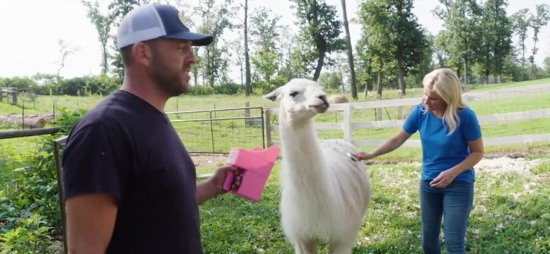 Image of Dave and Jenny Marrs with their Llama Miracle, Larry