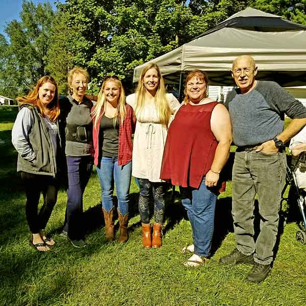 Image of Dr. Pol's cast, Dr. Michele Sharkey, Diane Pol, Nicole Arcy, Dr. Emily Thomas, Dr. Brenda, and Dr. Pol, from left to right